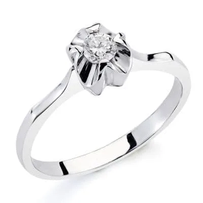 18K SOLITARIO ORO BLANCO DIAMANTE NATURAL TALLA BRILLANTE 0.20 QTS. ANCHO: 6MM.