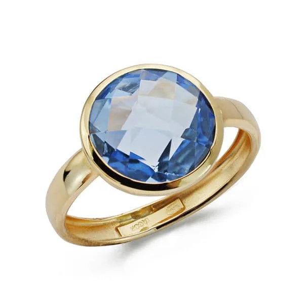 9K SORTIJA ORO AMARILLO CON CIRCONITA AZUL EN BOCEL. ANCHO: 12 MM