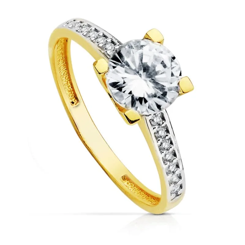 18K SOLITARIO ORO BICOLOR CON CIRCONITA y 4 GARRAS CON CIRCONITA 7MM