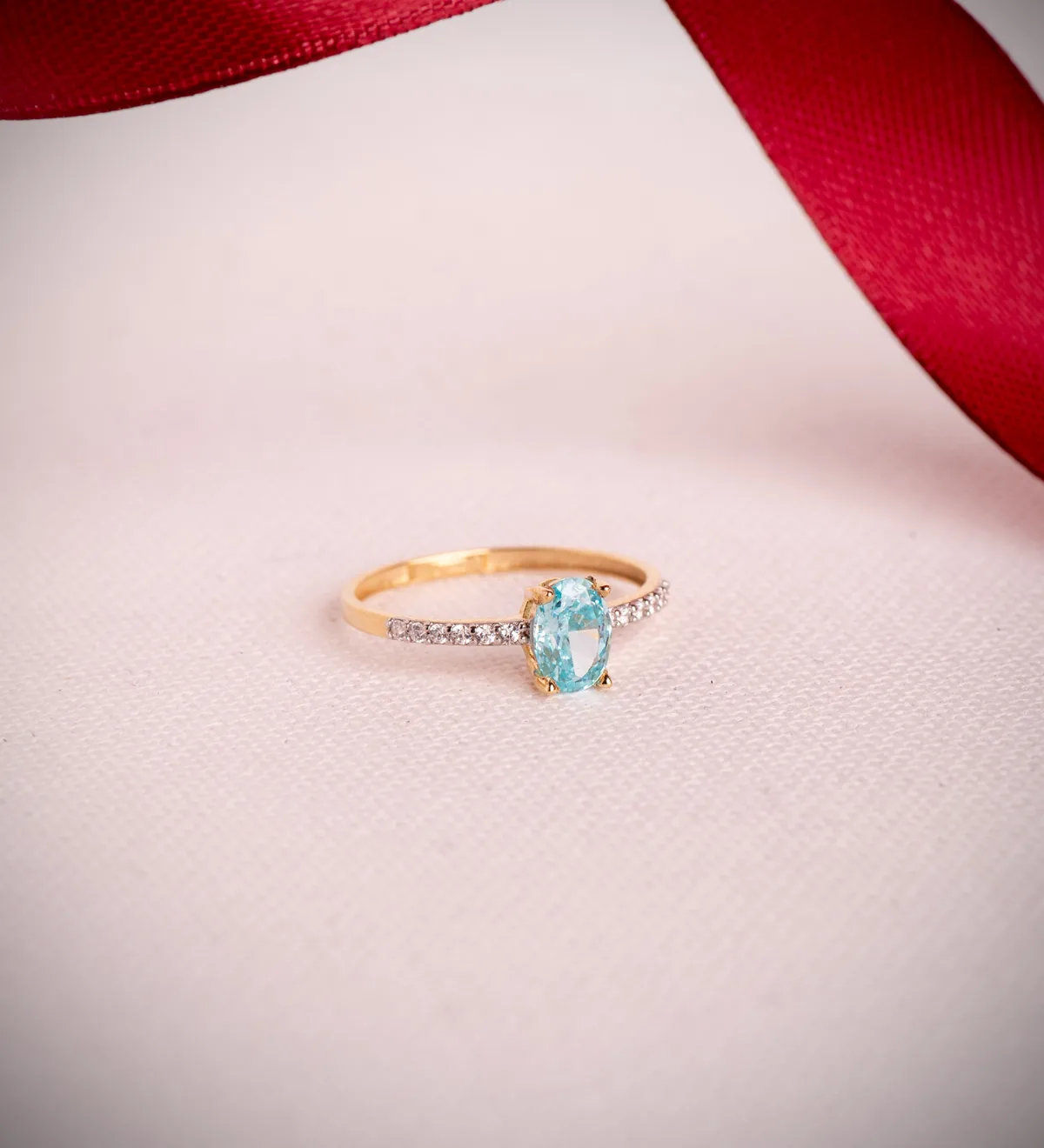 18K SORTIJA ORO BICOLOR TOPACIO NATURAL PARAIBA OVAL 7X5MM 0,93 QTS. Y CIRCONITAS — vista 2