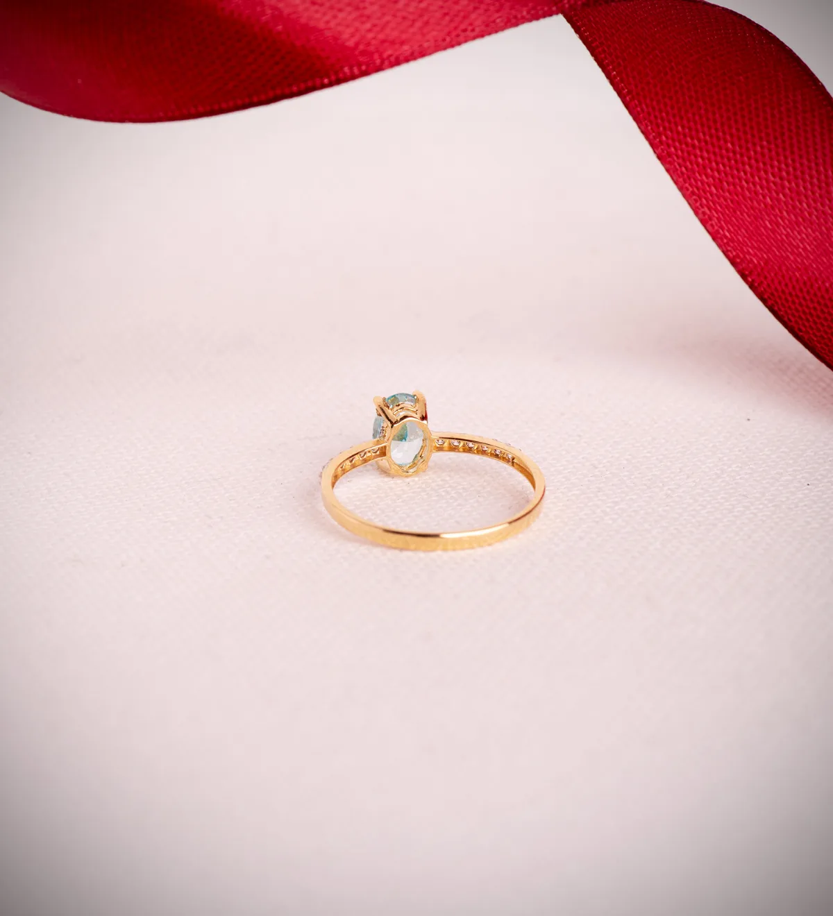 18K SORTIJA ORO BICOLOR TOPACIO NATURAL PARAIBA OVAL 7X5MM 0,93 QTS. Y CIRCONITAS — vista 3
