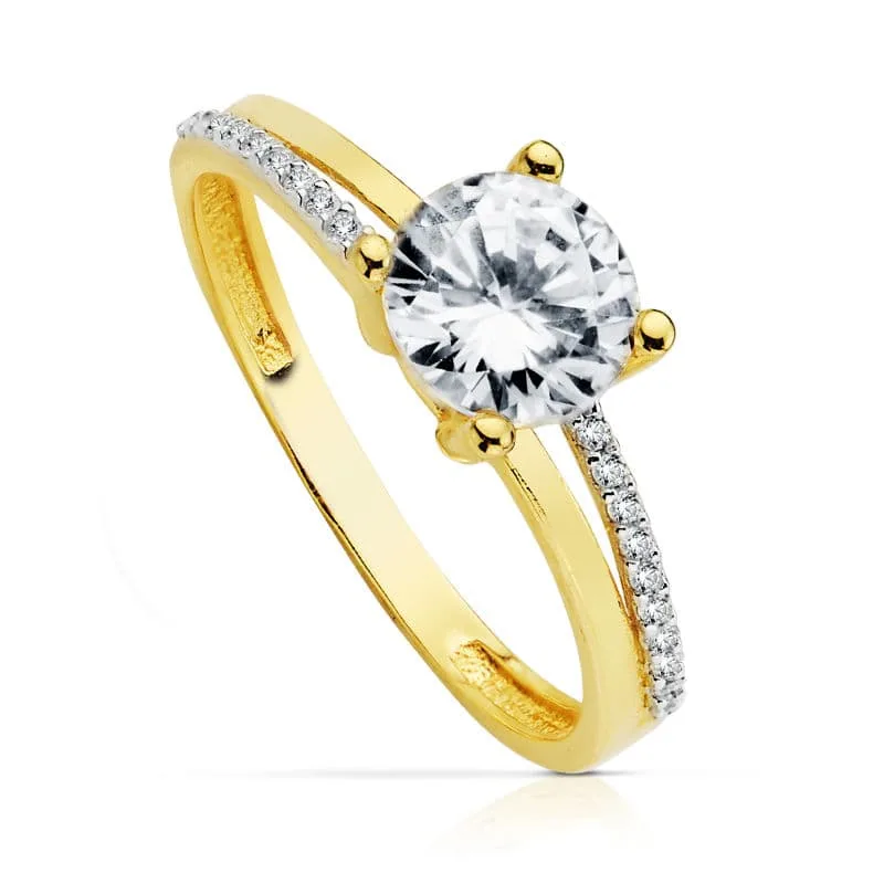 18K SOLITARIO ORO BICOLOR CON CIRCONITA Y 4 GARRAS CON CIRCONITA DE  7 MM