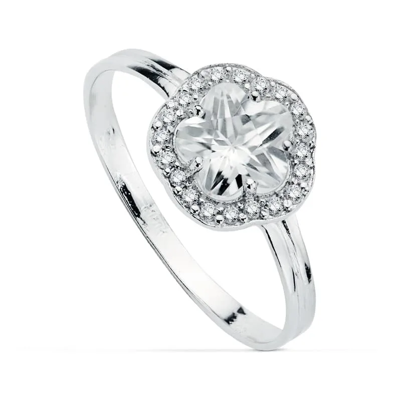 18K SORTIJA ORO BLANCO CON FLOR Y CIRCONITAS. ANCHO: 9 MM