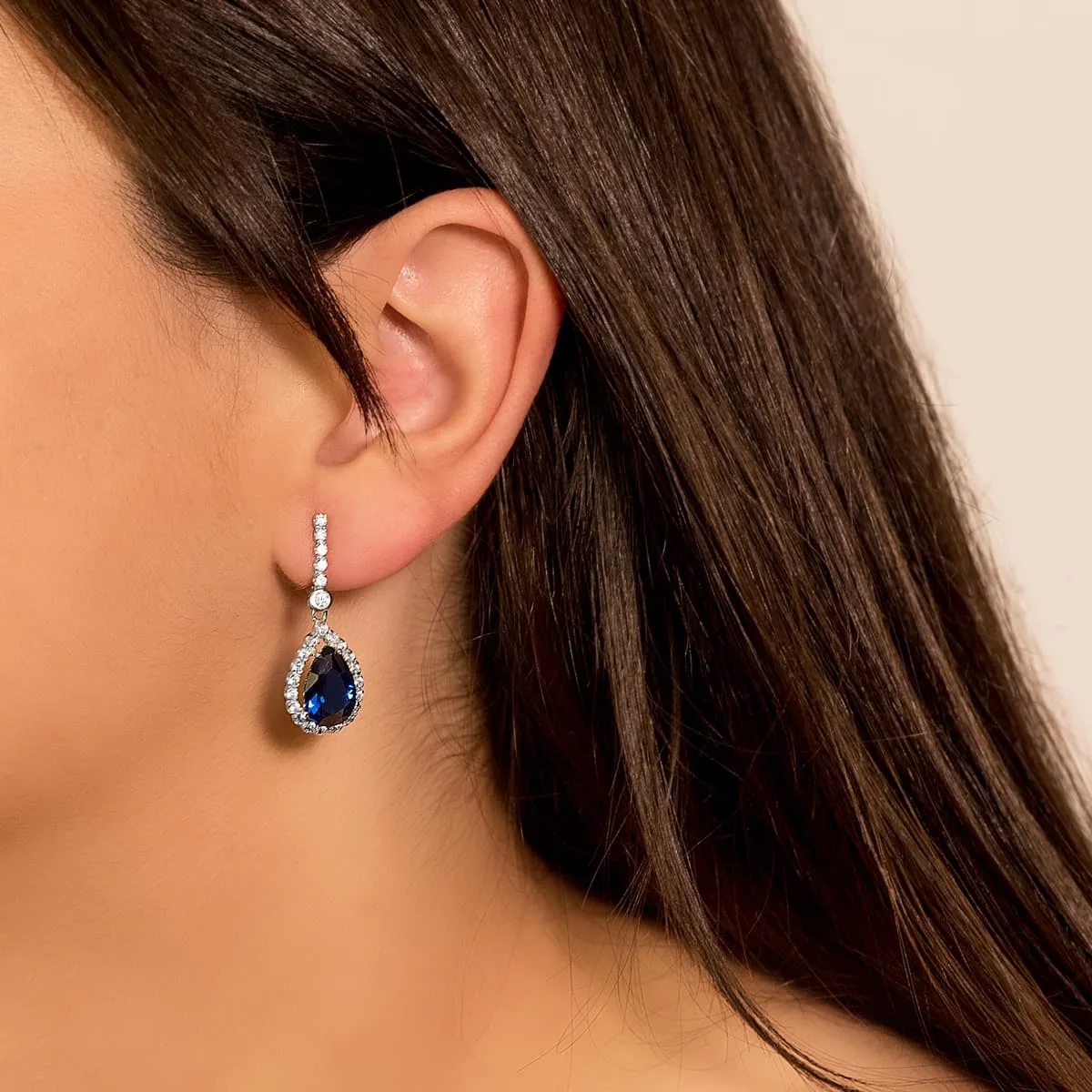 18K PENDIENTES ORO BLANCO DOS CUERPOS CON PIEDRA AZUL 12 X 8MM. 33X12MM CIERRE PRESION — vista 2