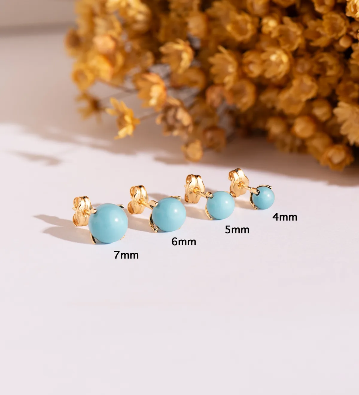 18K PENDIENTES ORO AMARILLO TURQUESA CON 4 GARRAS. MEDIDA: 7 MM. CIERRE PRESION — vista 2