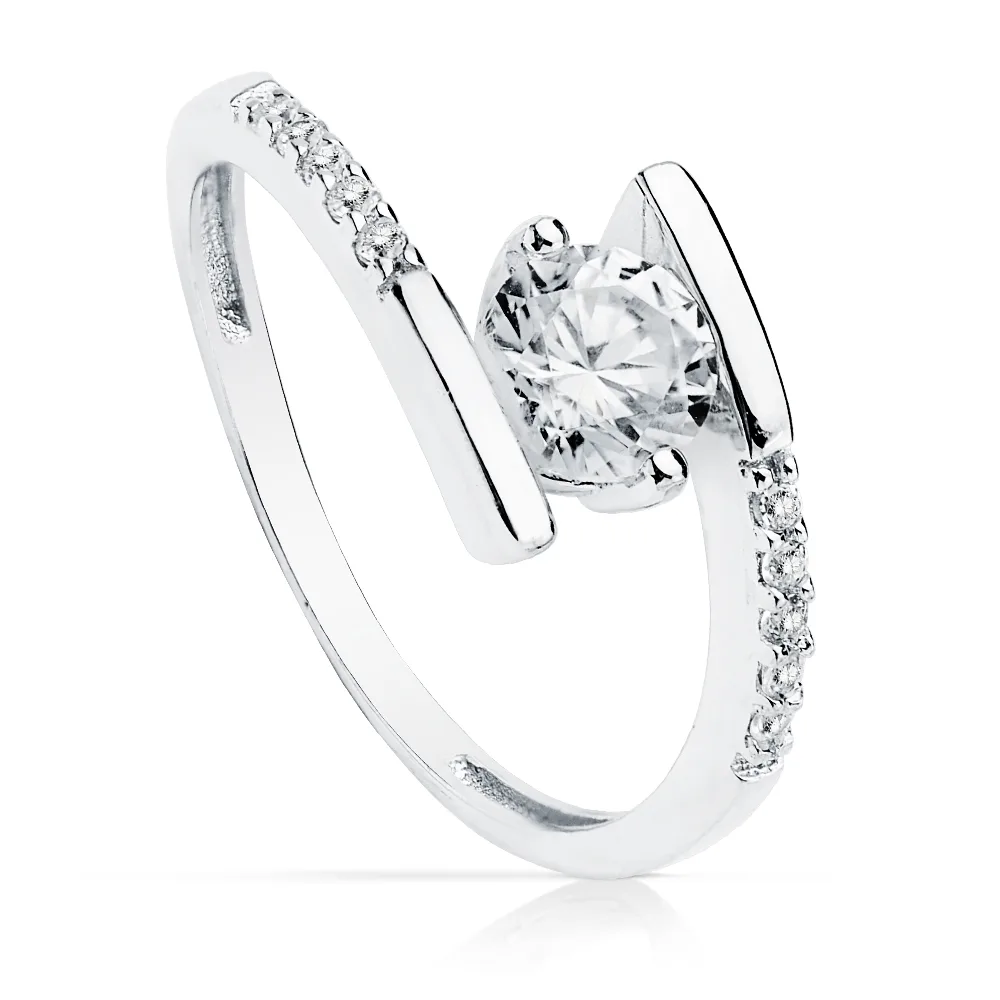 18K SOLITARIO ORO BLANCO CRUZADO CON CIRCONITA 5.5 MM